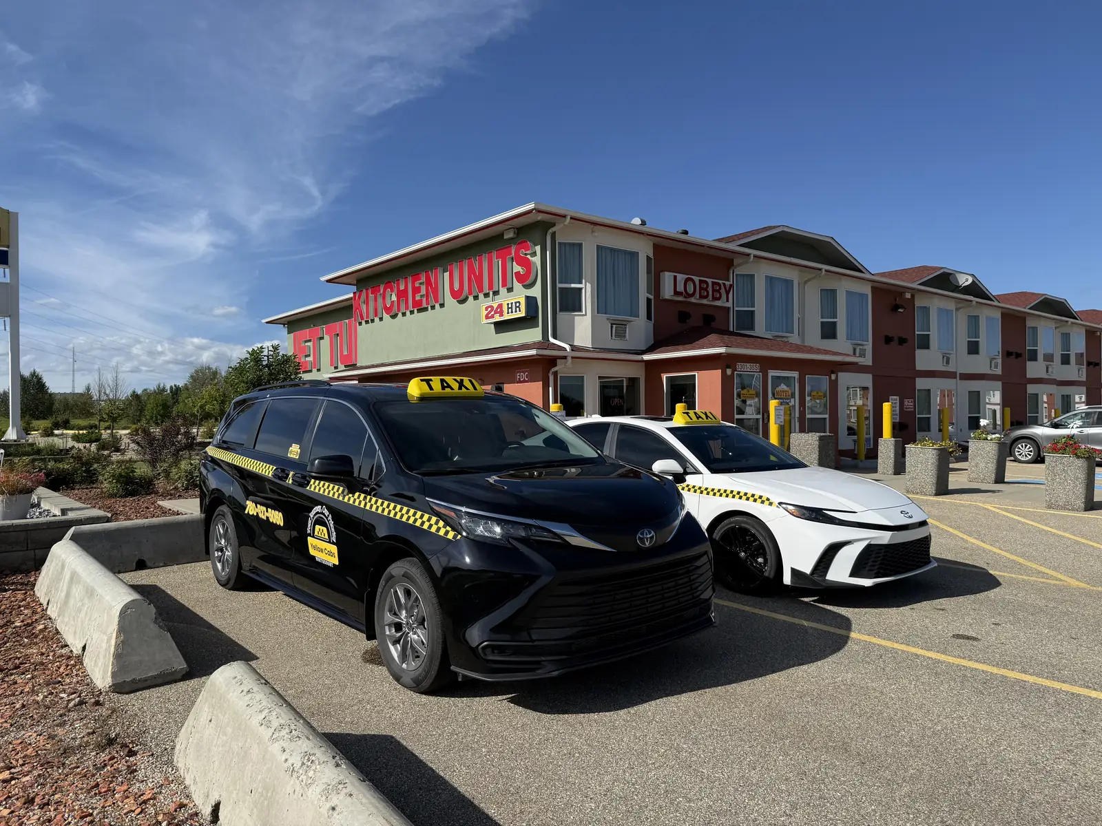 Yellow Cabs Whitecourt taxi on a sunny day in Whitecourt